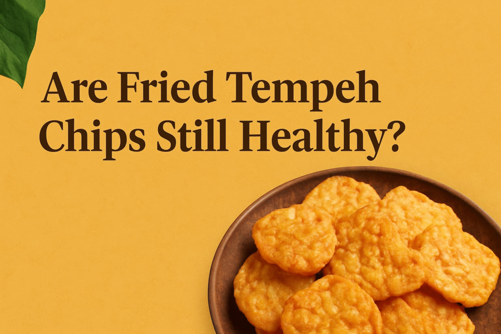 “A plate of crispy, golden fried tempeh chips, accompanied by the question "Are Fried Tempeh Chips Still Healthy?", highlighting the nutritional aspects of this snack”.