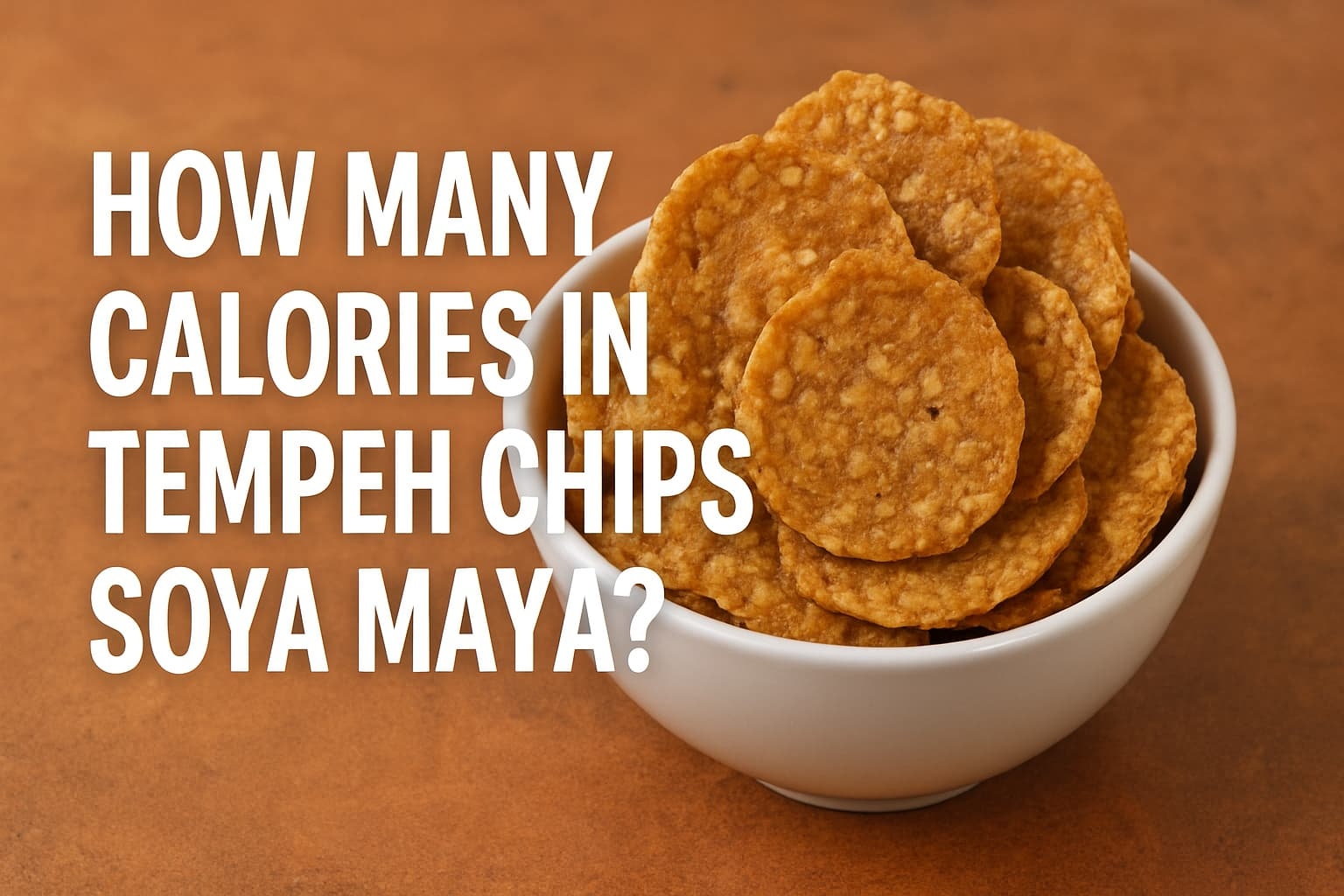“Image showing a bowl of Soya Maya tempeh chips, with the question "How many calories in tempeh chips Soya Maya?" prominently displayed”.