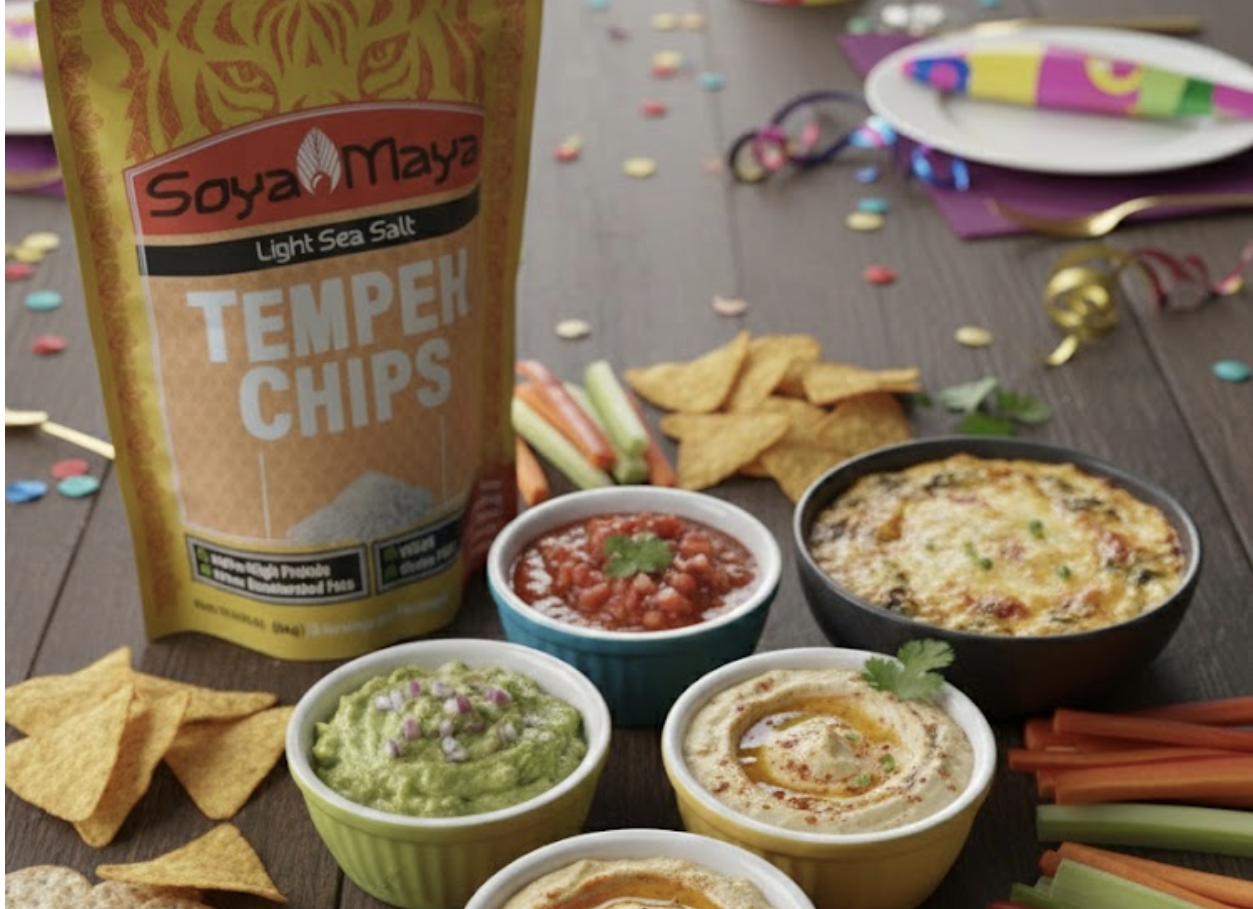 Golden Soya Maya Tempek Chips with assorted dips and snacks on a festive table.